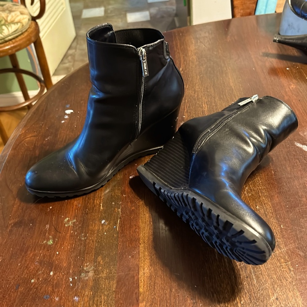 Black faux leather wedge ankle boots